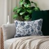 Blue Roses Lumbar Pillow on couch