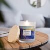 Lavender Fields wood wick lit candle on table