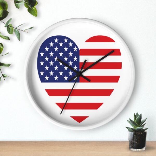 american flag heart wall clock white frame black hands above shelf