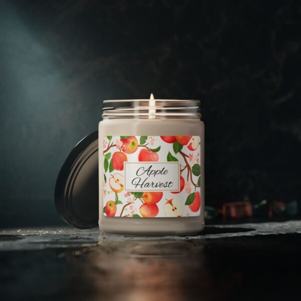 apple harvest soy wax lit candle with gray studio lights