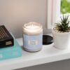 clean cotton lit candle 9oz clear jar on shelf