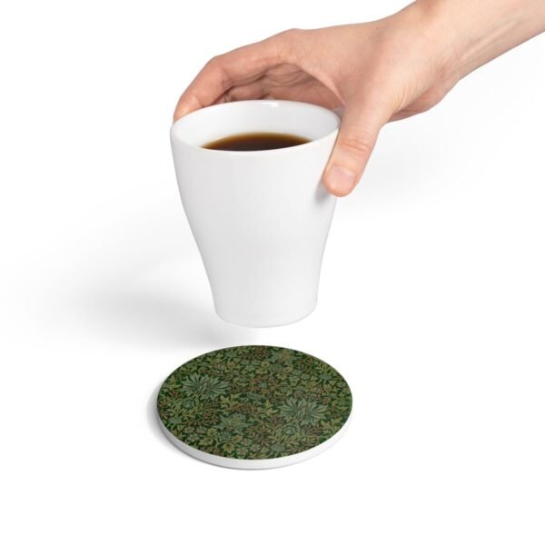 flower garden William Morris ceramic tile coaster round with hand holding coffee mug