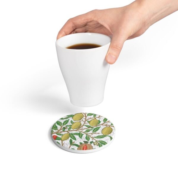 fruit William Morris ceramic tile coaster round with hand holding coffee cup fruit William Morris ceramic tile coaster round with hand holding coffee cup