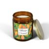 mango coconut candle amber jar with lid off