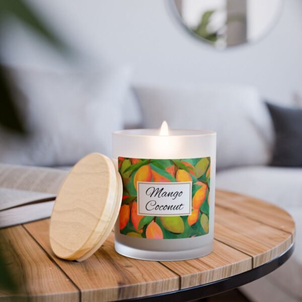 mango coconut wood wick lit candle on wood table mango coconut wood wick lit candle on wood table