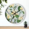 vanilla bean wall clock white frame black hands over shelf