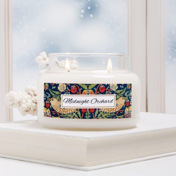 Midnight Orchard 2 wick apothecary candle in a winter scene