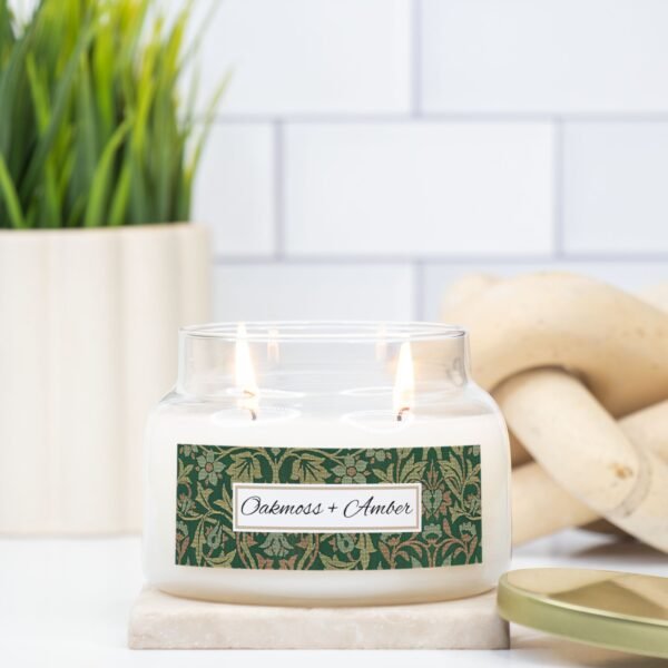 Oakmoss Amber 2 wick apothecary candle in a kitchen setting