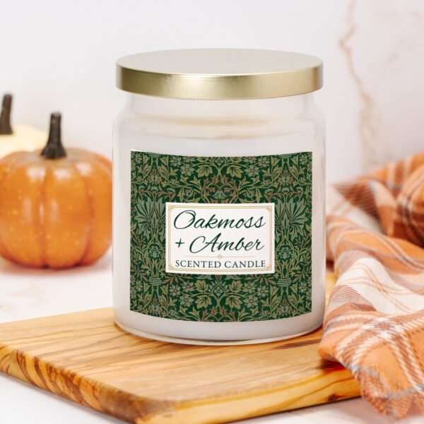 Oakmoss Amber candle in apothecary jar in kitchen with pumpkin