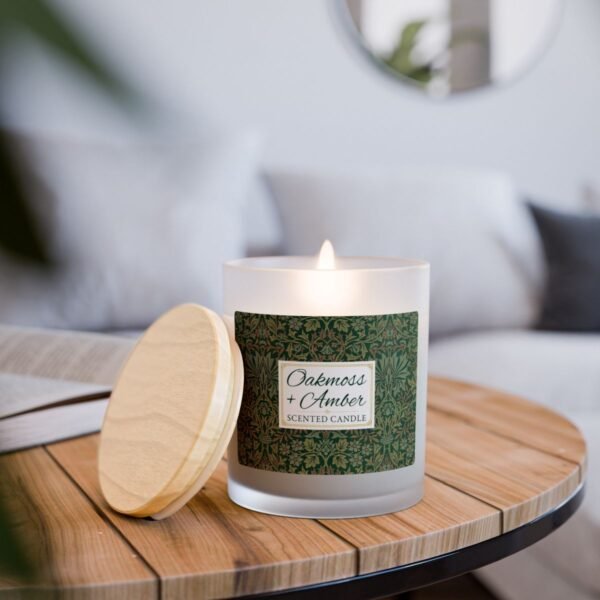 Oakmoss Amber wood wick lit candle on table Oakmoss Amber wood wick lit candle on table