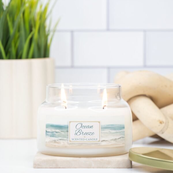 Ocean Breeze 2 wick apothecary lit candle on counter