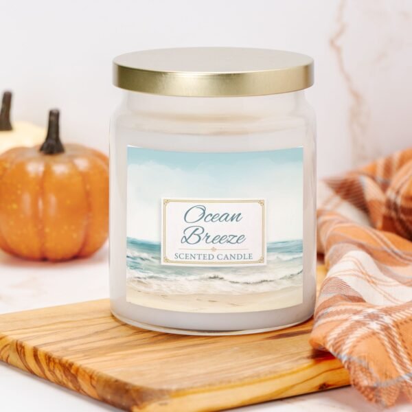 Ocean Breeze coastal candle in apothecary jar on counter with pumpkin