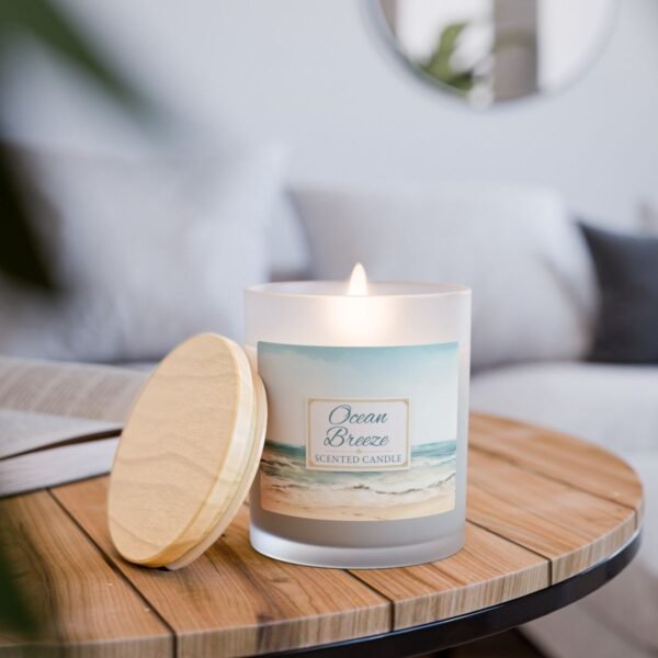 Ocean Breeze wood wick lit candle sitting on table