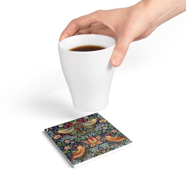 Strawberry Thief ceramic tile coaster with hand holding coffee cup Strawberry Thief ceramic tile coaster with hand holding coffee cup
