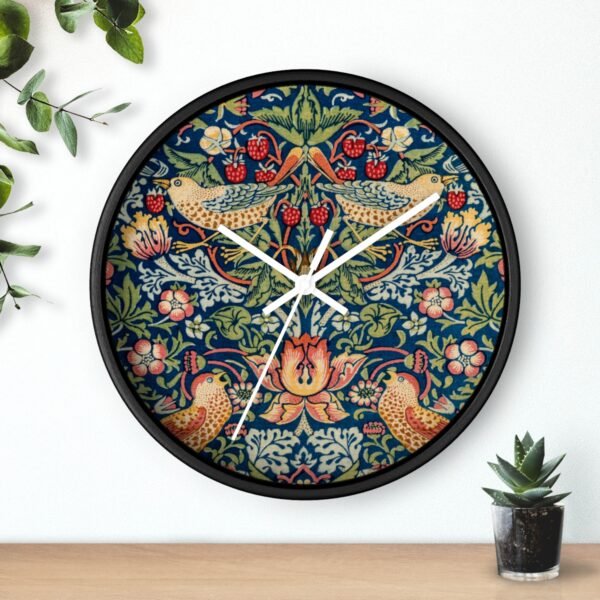 Strawberry Thief wall clock black frame white hands over shelf