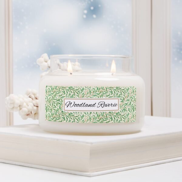 Woodland Reverie 2 wick apothecary candle in a winter scene