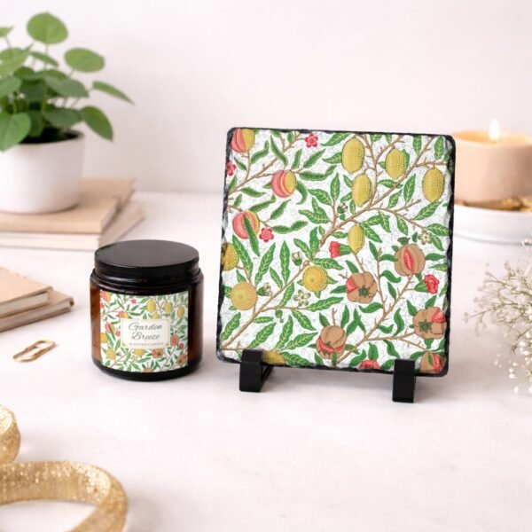 Garden Breeze candle with fruit imagae on slate sitting on a counter