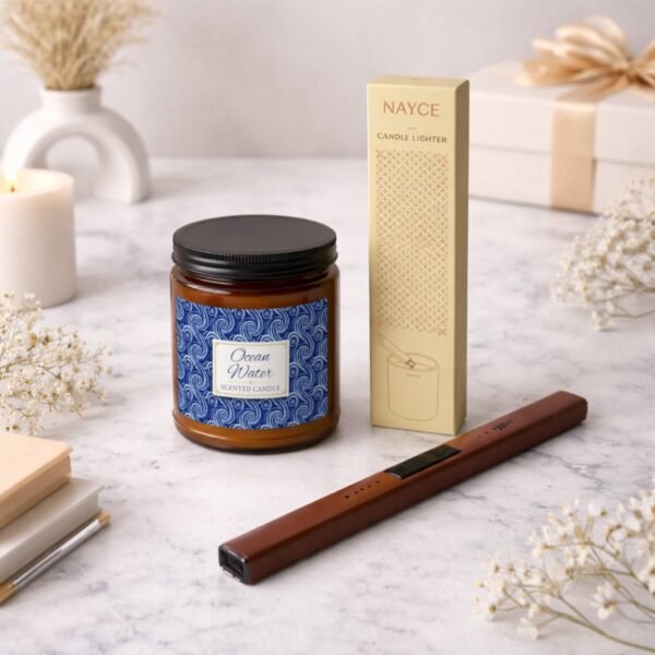 Ocean Water candle and electric lighter sitting on counter