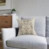 Botanical Motif pillow on blue chair Botanical Motif pillow on blue chair