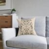 Botanical Motif pillow on blue chair Botanical Motif pillow on blue chair