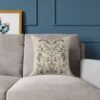 Botanical Motif pillow on taupe couch Botanical Motif pillow on taupe couch