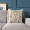 Botanical Motif pillow on taupe couch Botanical Motif pillow on taupe couch