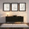 Tranquil Botanical canvas wall art set in black gold frames in entryway Tranquil Botanical canvas wall art set in black gold frames in entryway