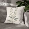 Tranquil Botanical pillow on gray couch