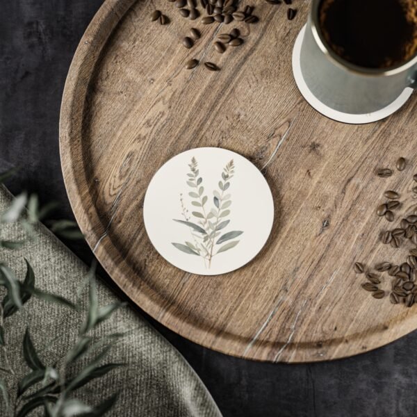 Tranquil Botanical round ceramic coaster on wood table Tranquil Botanical round ceramic coaster on wood table