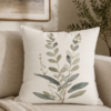 Tranquil Botanical throw pillow on beige couch