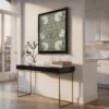 Pimpernel canvas wall art above black gold console table
