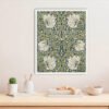 Pimpernel canvas wall art in white frame above desk
